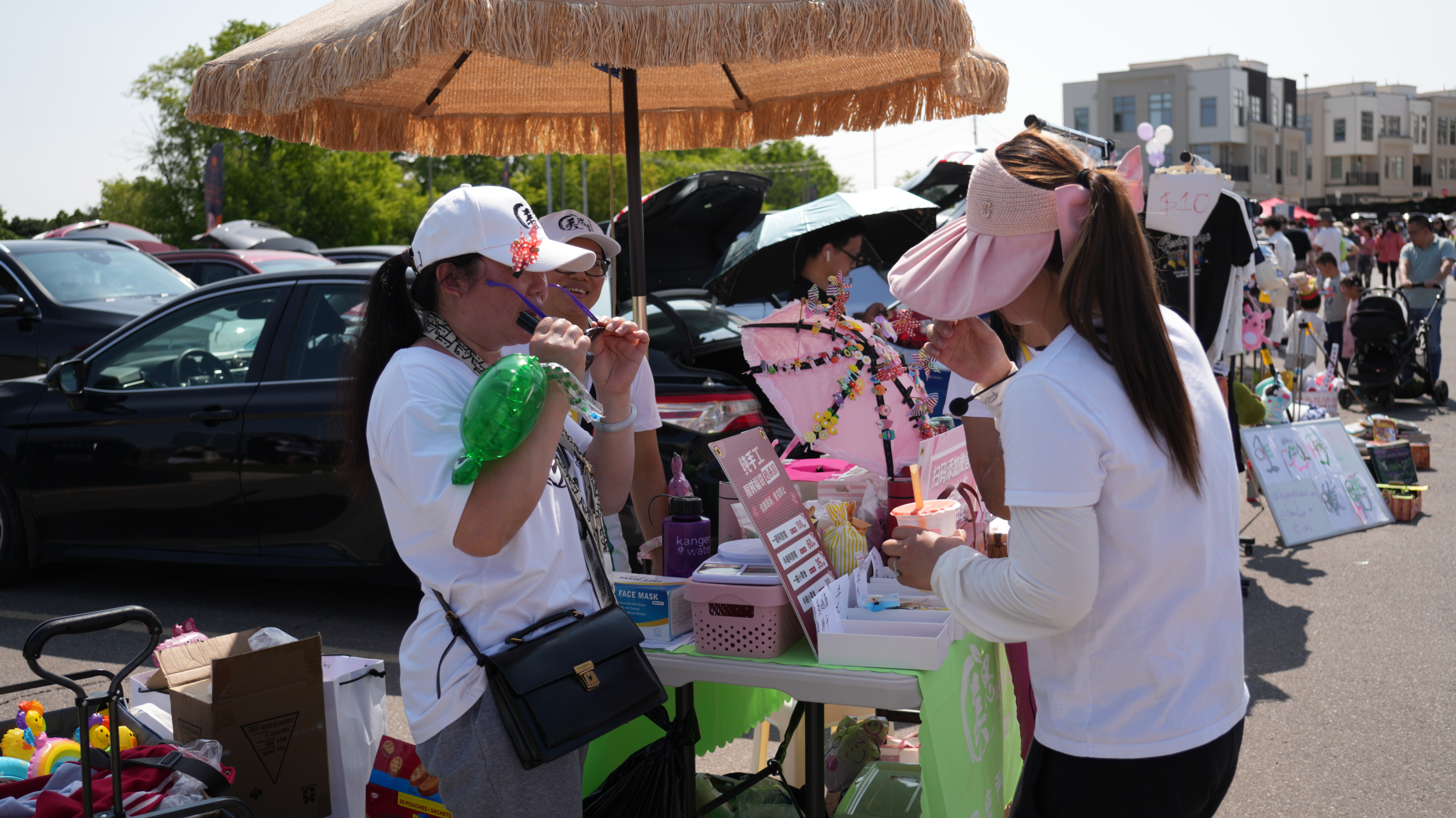 Trunk Sale Event — families and booths